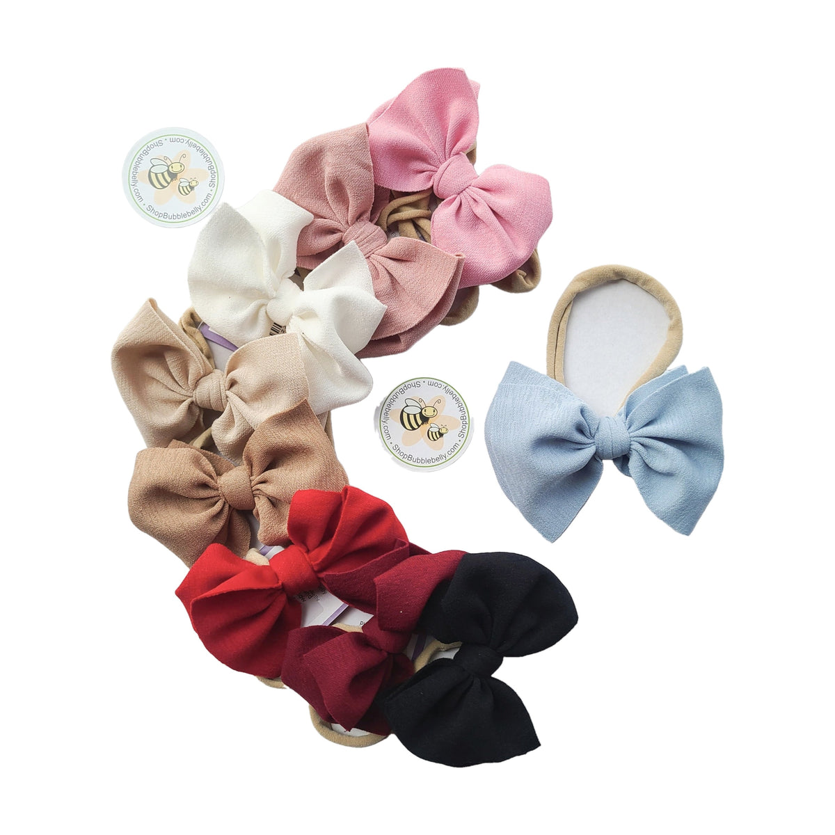Stretchy fabric hair bows on nylon for babies and kids. Handmade hair bow.