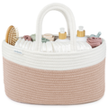 Two-tone roped diaper caddy in blush pink and white filled with diapers and wipes