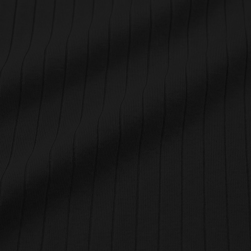 Black ribbed modal pajama set, shirred rib knit fabric close up