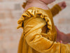 Golden velvet bubble romper, long sleeve ruffled shoulder