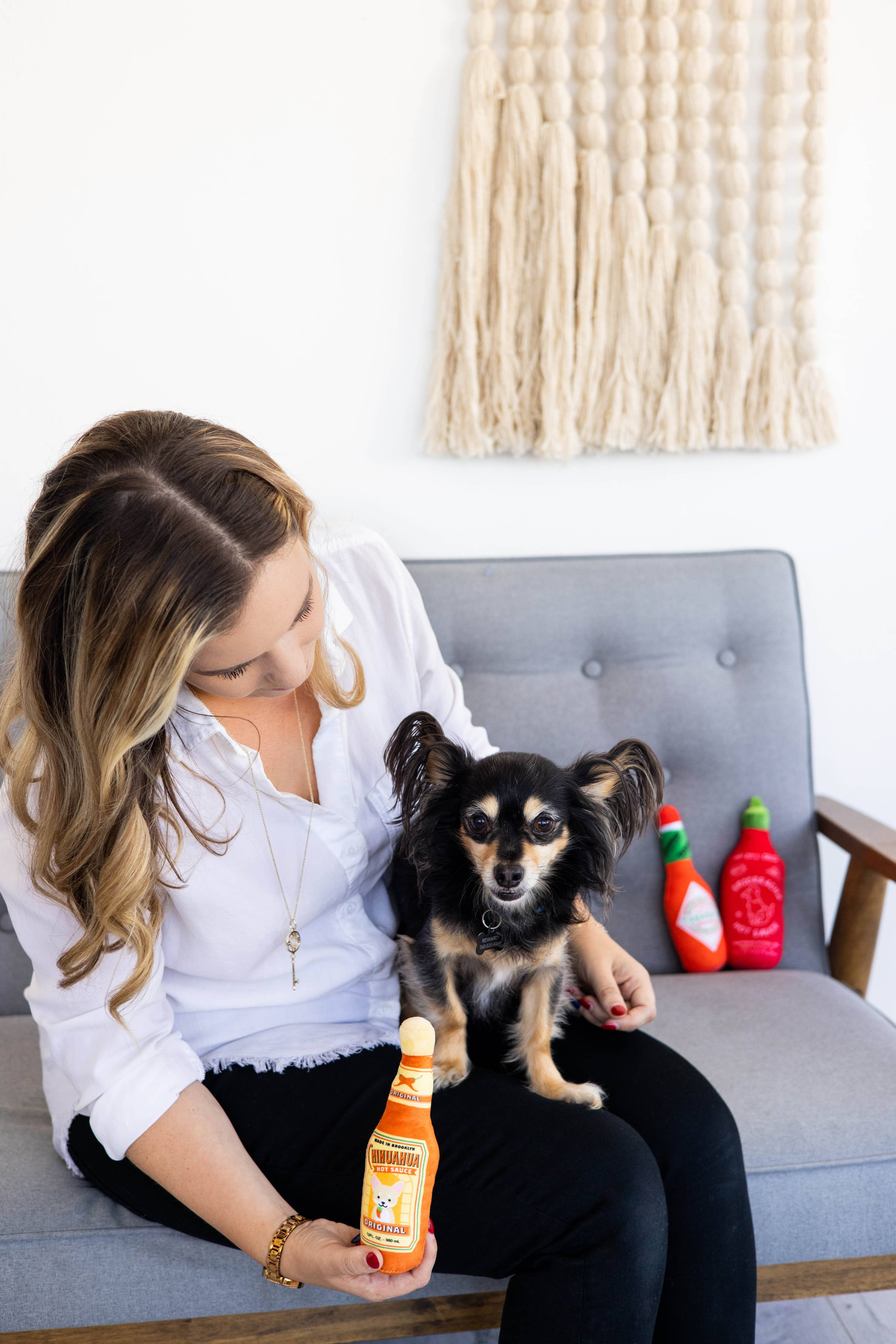 Who doesn't love Sriracha, Cholula, and Tobasco? Hot sauce Dog toys