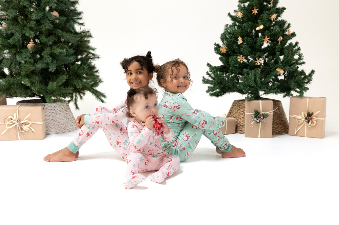 Angel Dear bamboo ruffled zip footie, Golf Mrs Claus pink, siblings in matching prints