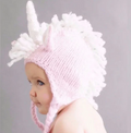 Baby knit unicorn hat, pink and white, worn by baby