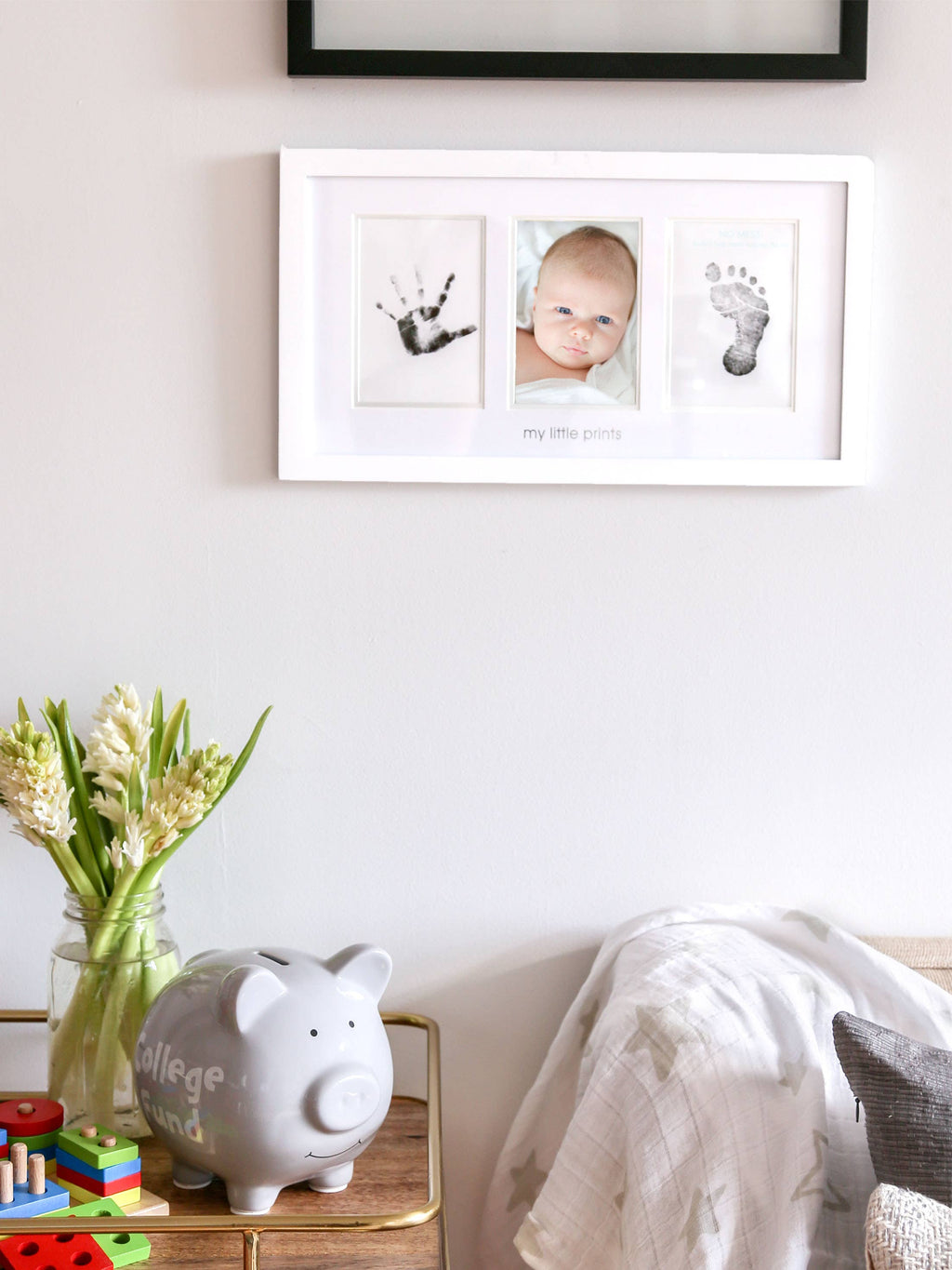 Babyprints handprint and footprint picture frame, on dresser