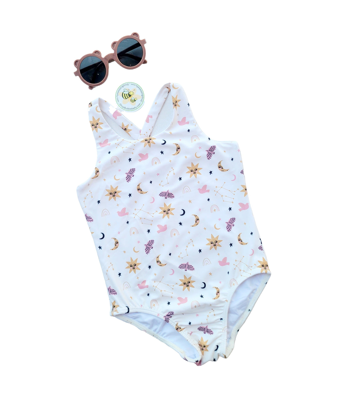 Girls criss cross zip swimsuit, sun moon and stars, front view