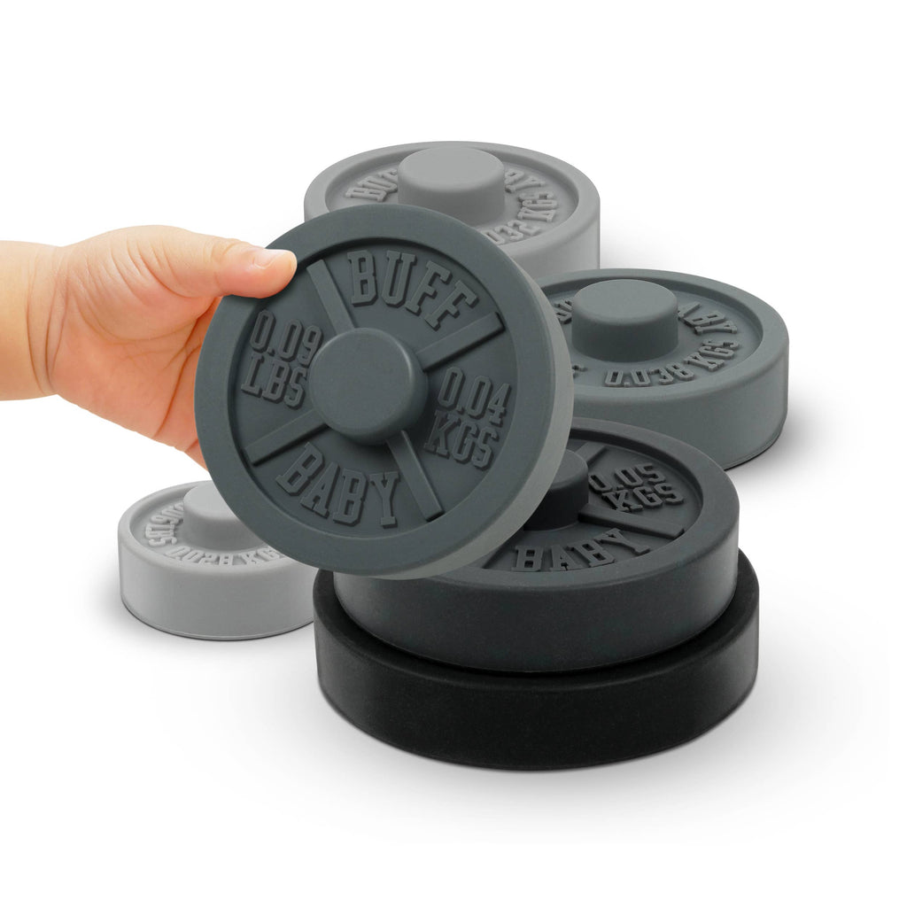 Fred & Friends Buff Baby weight plate stacker and teether, plates in a pile
