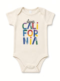 Davis California color block organic cotton baby snap bodysuit in cream with rainbow letters