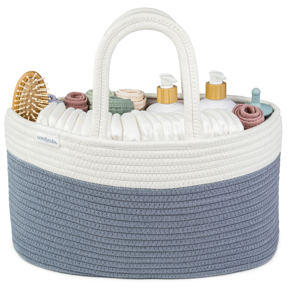 Two-tone roped diaper caddy in chalky blue and white filled with diapers and wipes