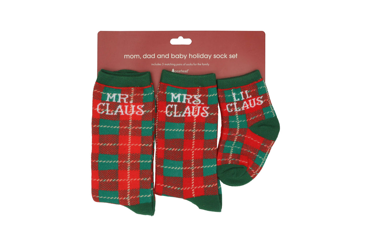 Red and green plaid family Christmas sock set, in the package