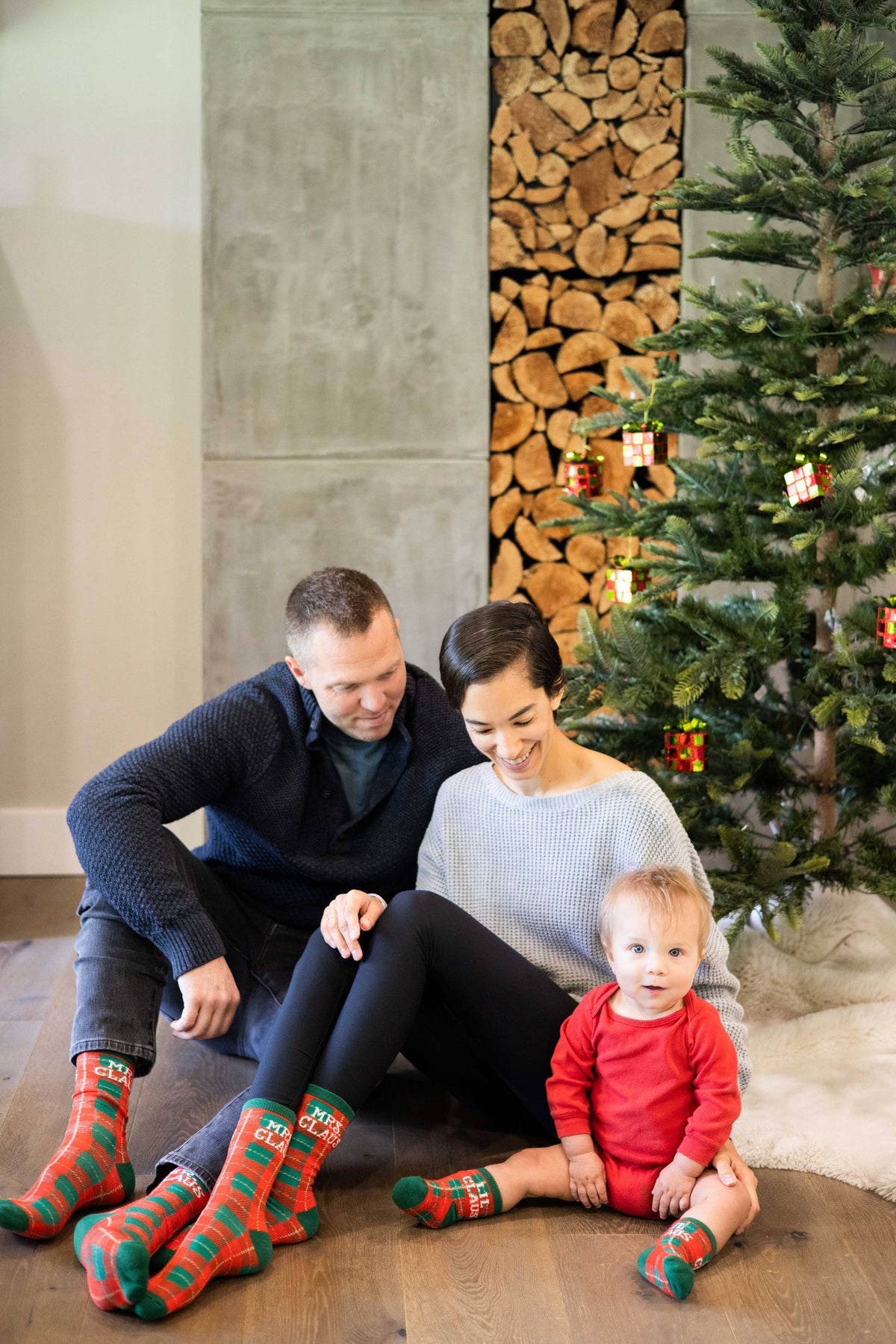 Family wearing matching Christmas socks