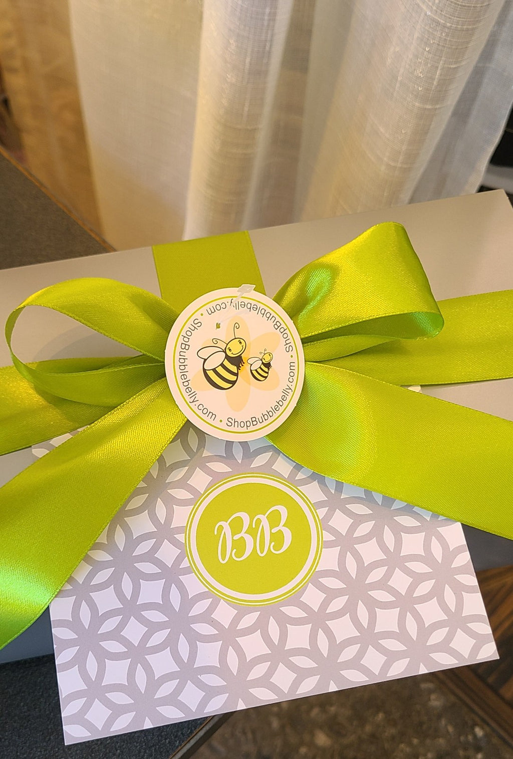 Lime green satin bow gift wrap with matching monogram gift card