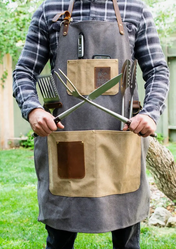 Leather and canvas apron, charcoal grey, worn at grill