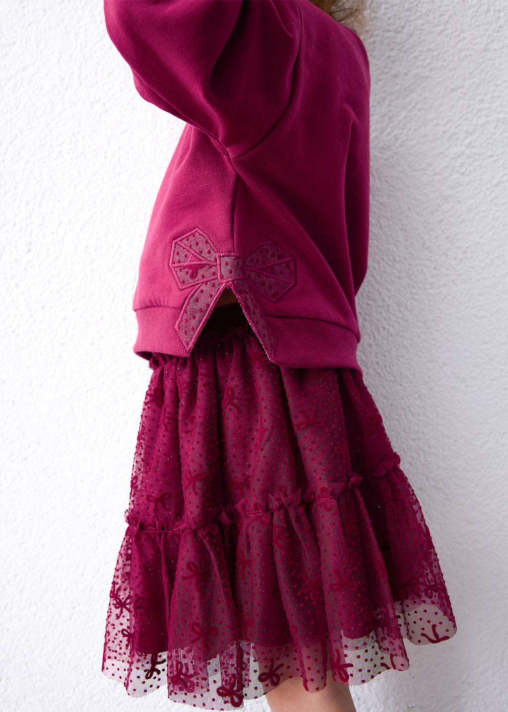 Mayoral 4934 mini girl raspberry 2pc sparkle tulle bow sweatshirt and skirt set - on model detail