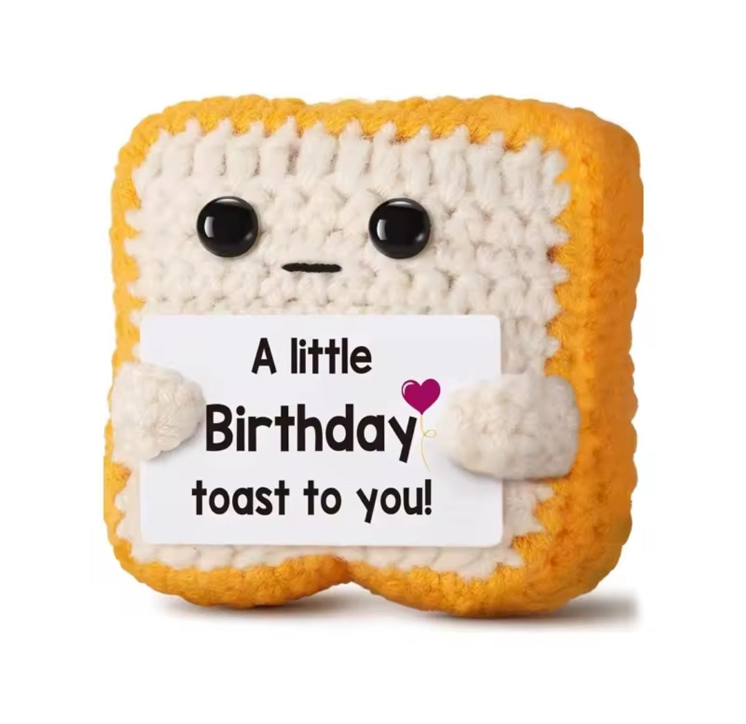 Handmade crochet birthday toast mini plush, with its A little Birthday toast to you tag