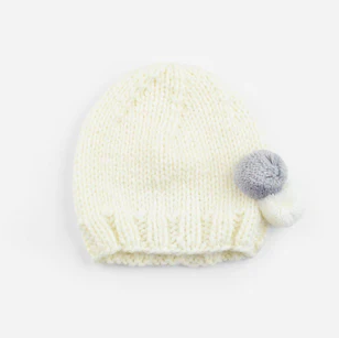 Kids knit pom pom beanie hat, white, front view