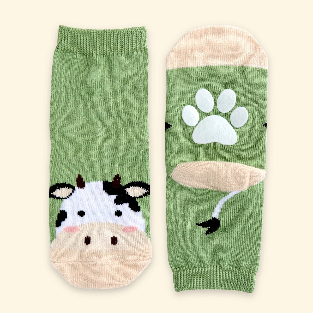 Green cow grip ankle socks, front cow face and non-slip paw grip sole