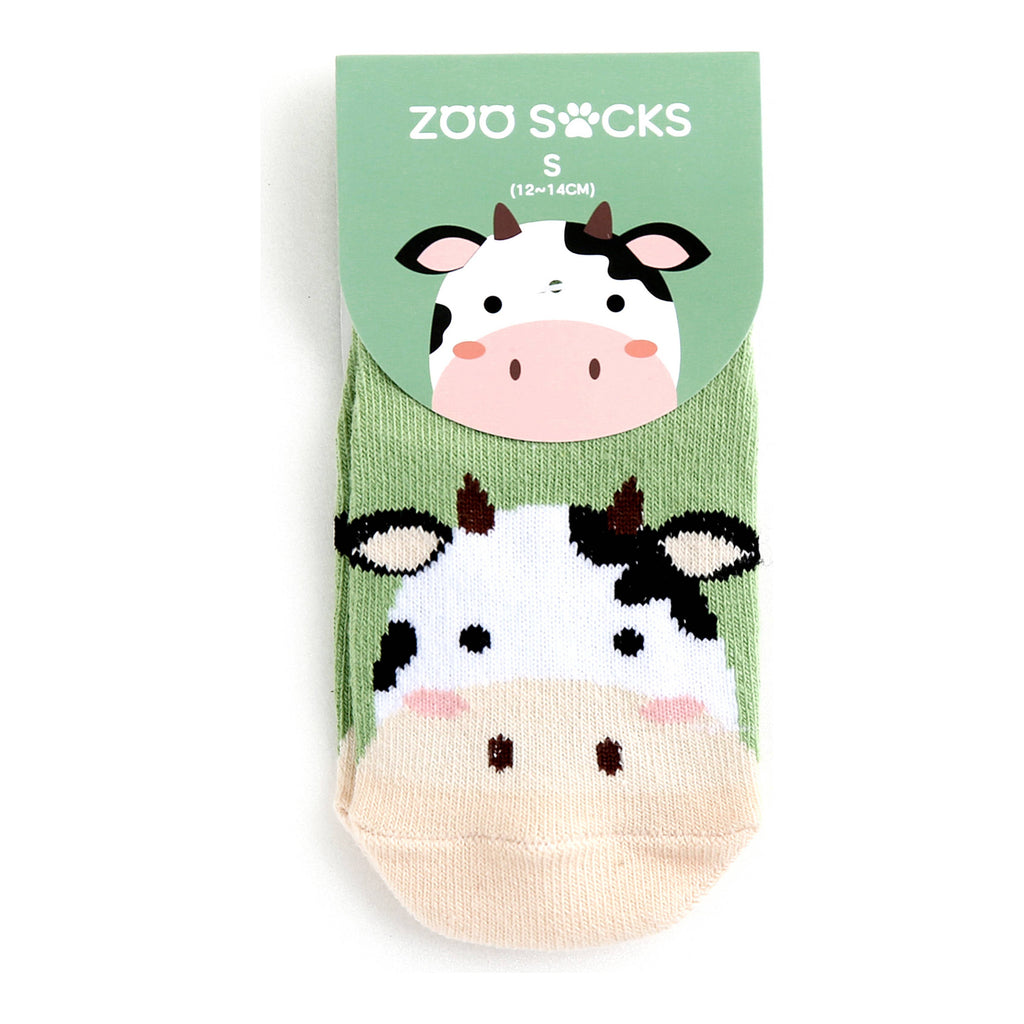 Green cow grip ankle socks in packaging