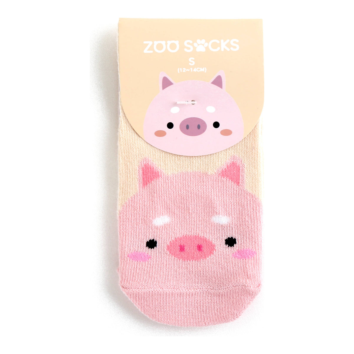 Pink pig grip ankle socks in packaging