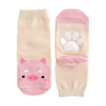 Cream and pink pig grip ankle socks, front pig face and non-slip paw grip sole