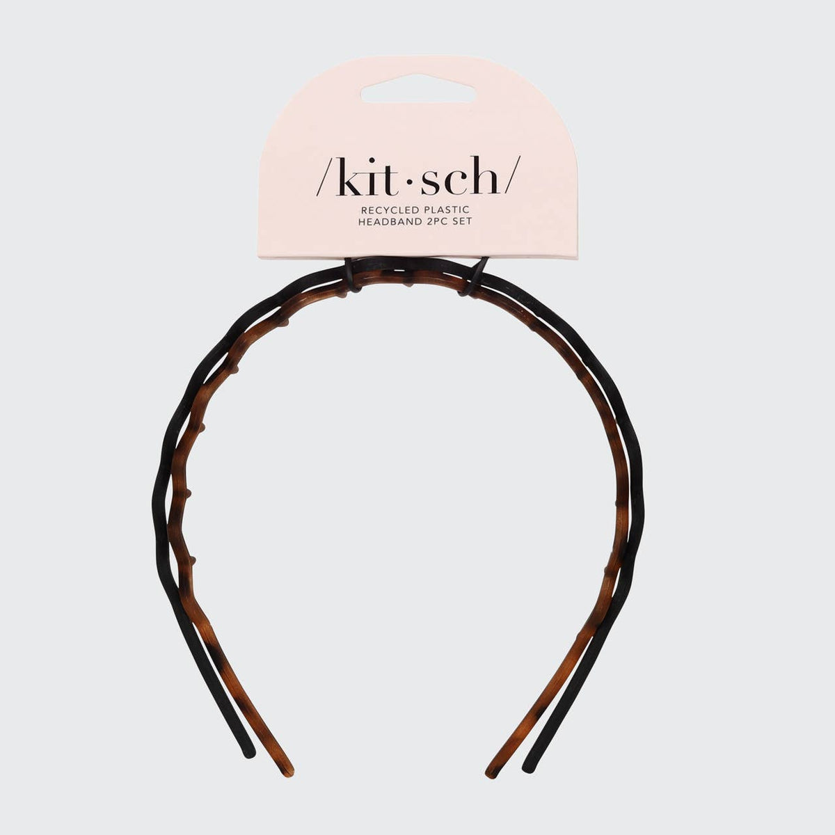Kitsch black and tortoise zig zag headbands, 2 pack, on its card