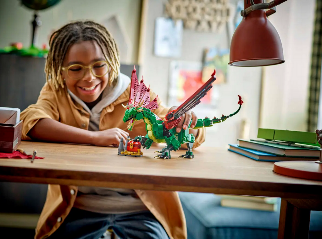 LEGO Creator 3-in-1 Medieval Dragon 31161, child building the dragon