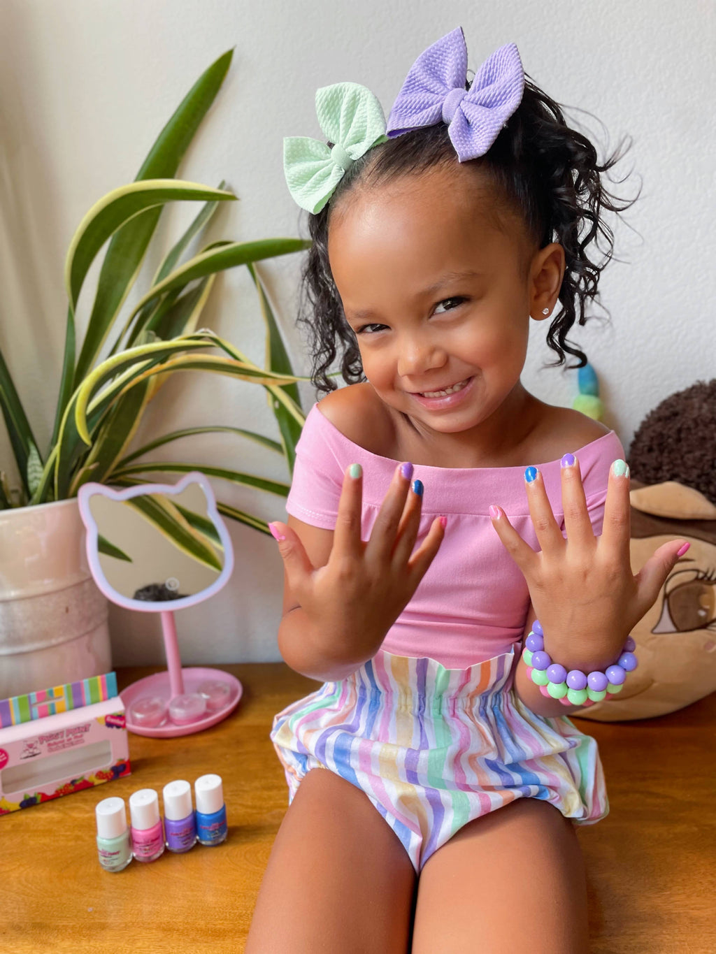 Piggy Paint Magical Melon scented mini nail polish, girl with painted nails