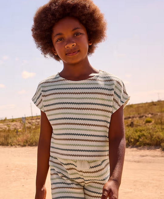 Mayoral girls bone clay stripe crochet look top, on a girl at the beach