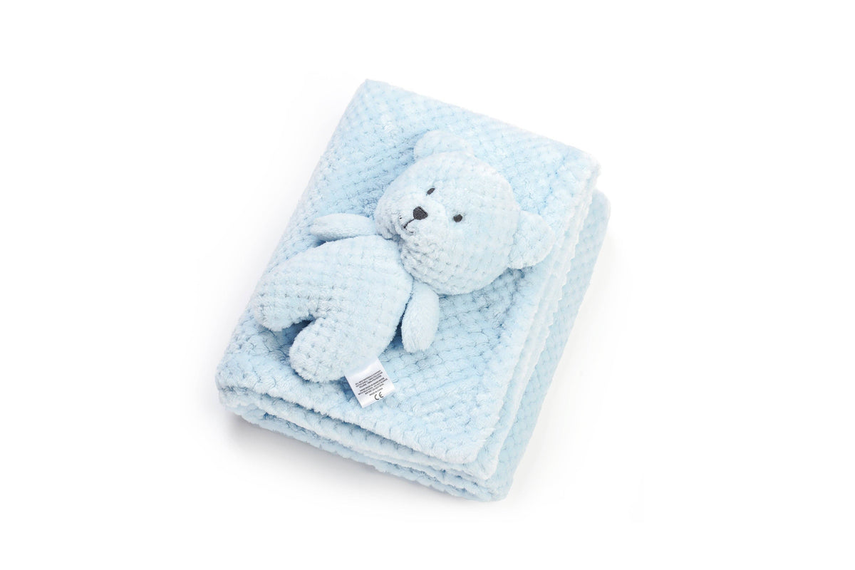 Blue minky plush baby blanket with bear cuddle toy, folded with the bear
