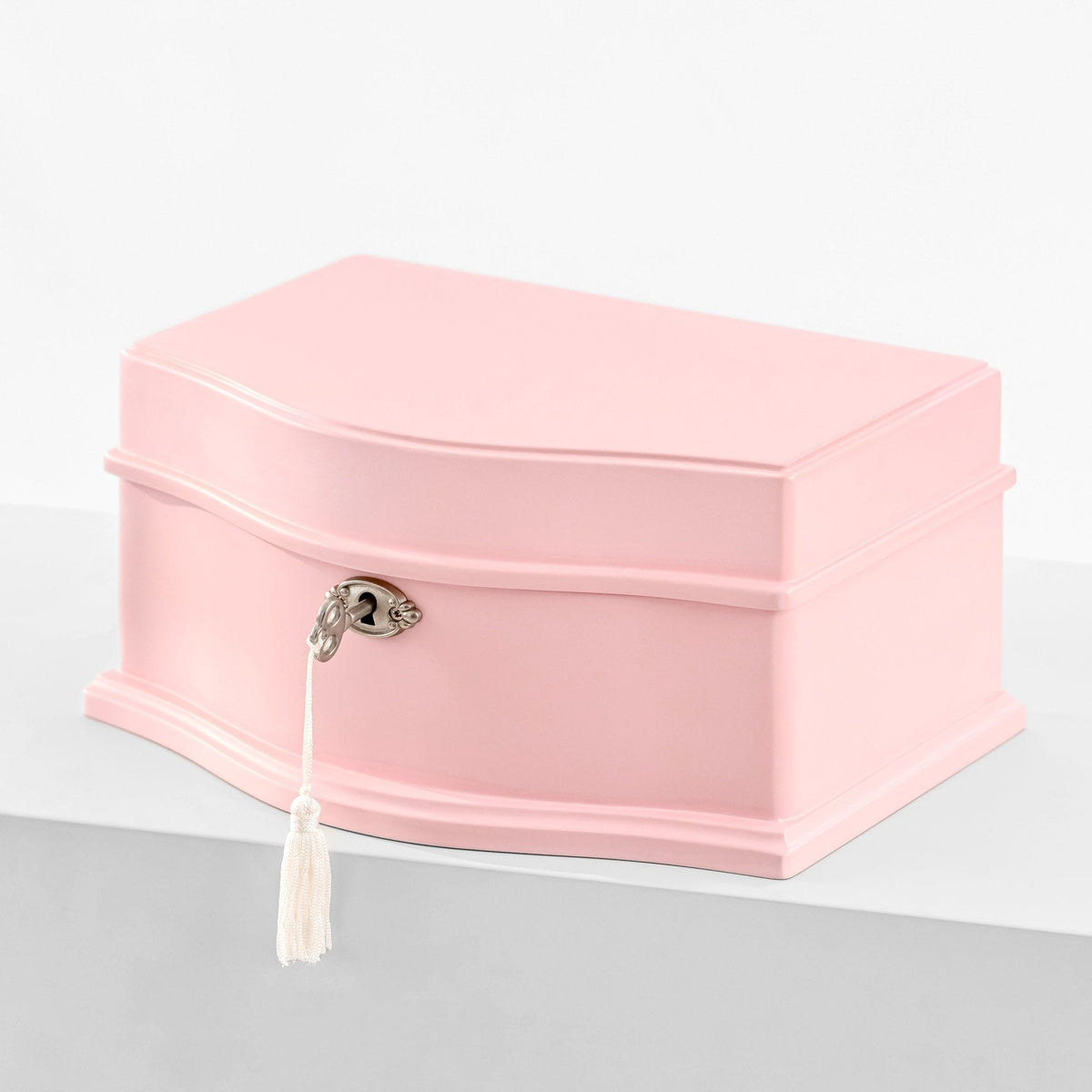 Large pink wooden musical jewelry box with lock and tassel key