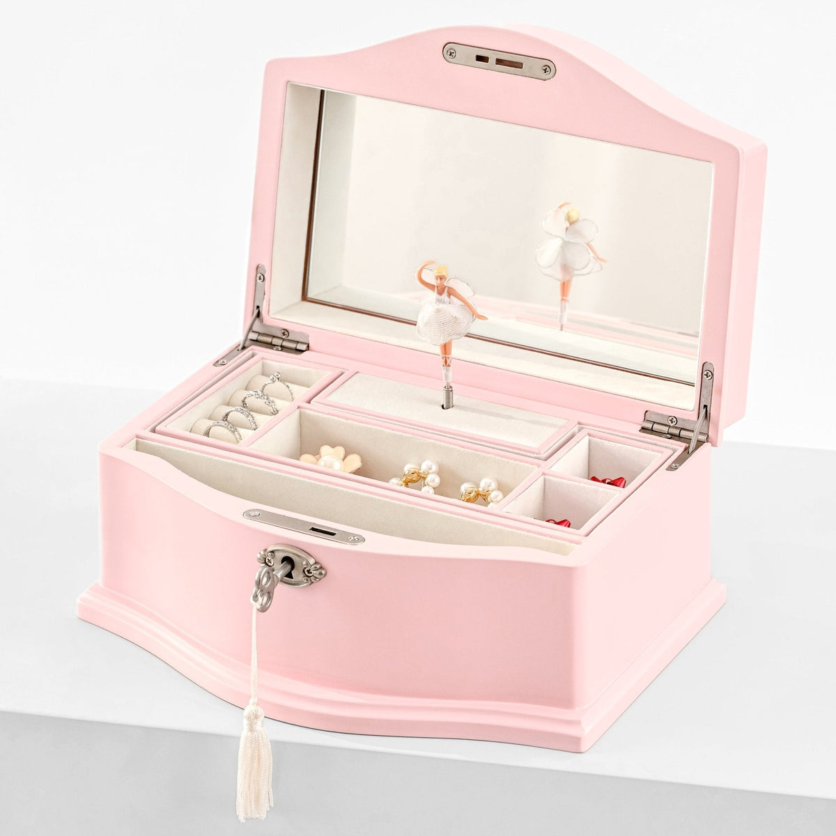 Pink musical jewelry box open with spinning ballerina and mirror
