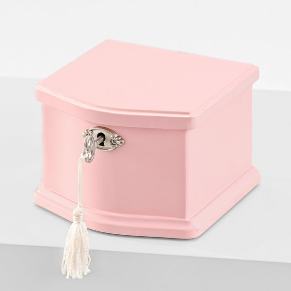 Small pink wooden musical jewelry box with lock and tassel key