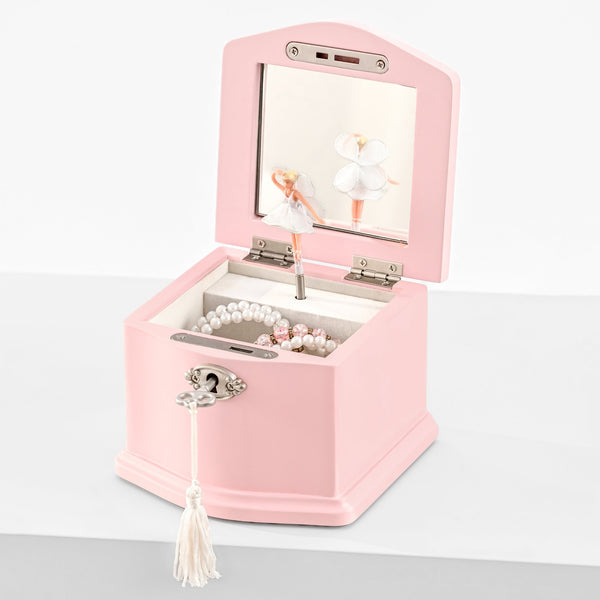Small pink jewelry box open with spinning ballerina