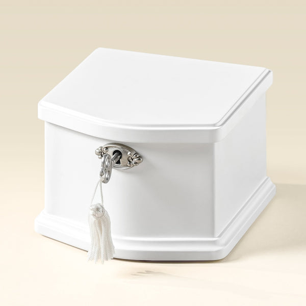 Small white wooden musical jewelry box with lock and tassel key