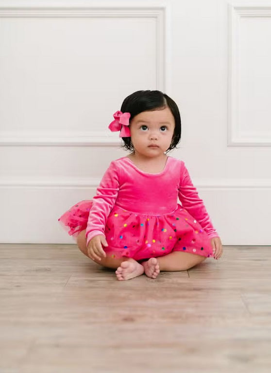 Ollie Jay velvet confetti tulle bodysuit dress, hot pink, sitting