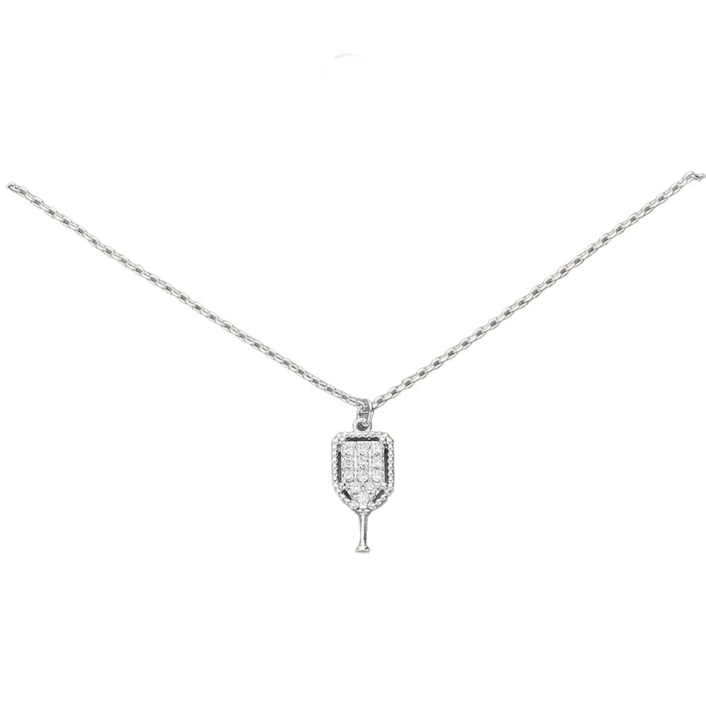 Pave crystal pickleball paddle pendant necklace, silver tone with clear stones, on white background