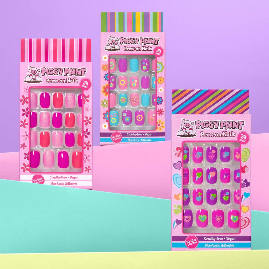 Piggy Paint Flower Power kids press-on nails, packages on a colorful background