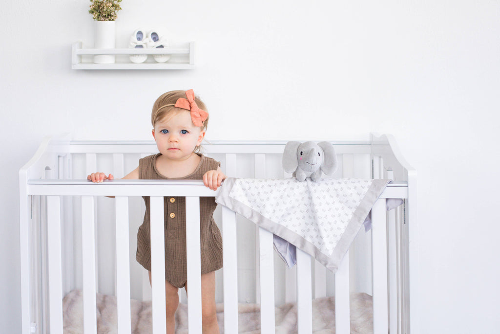 Minky elephant lovey blanket, grey, in crib