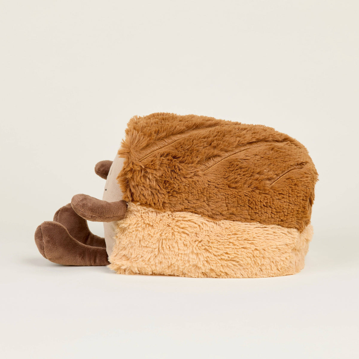 Warmies 13 inch heatable bread plush, side view