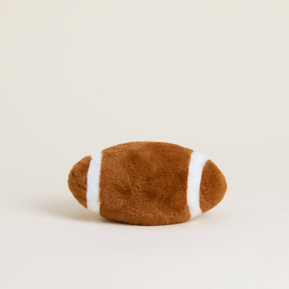 Warmies Junior 9 inch heatable football plush, side view