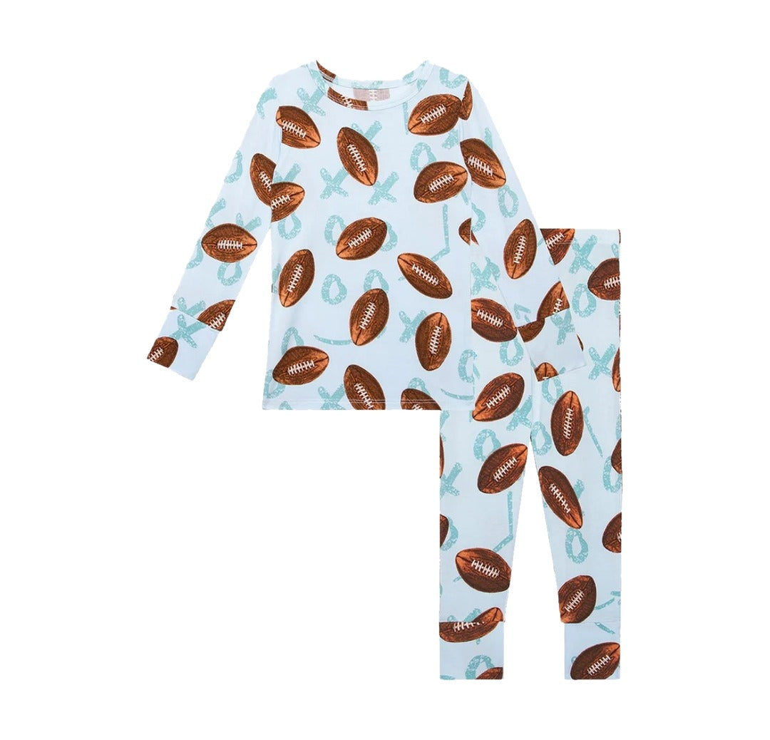 Posh Peanut kids bamboo long sleeve two piece pajamas in Field Day football print, flat lay