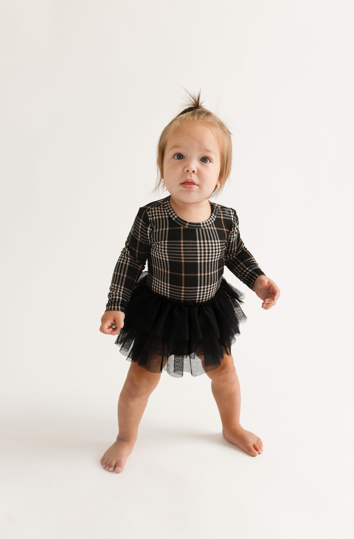 Posh Peanut tulle twirl bodysuit dress, Sanders black plaid, worn by toddler