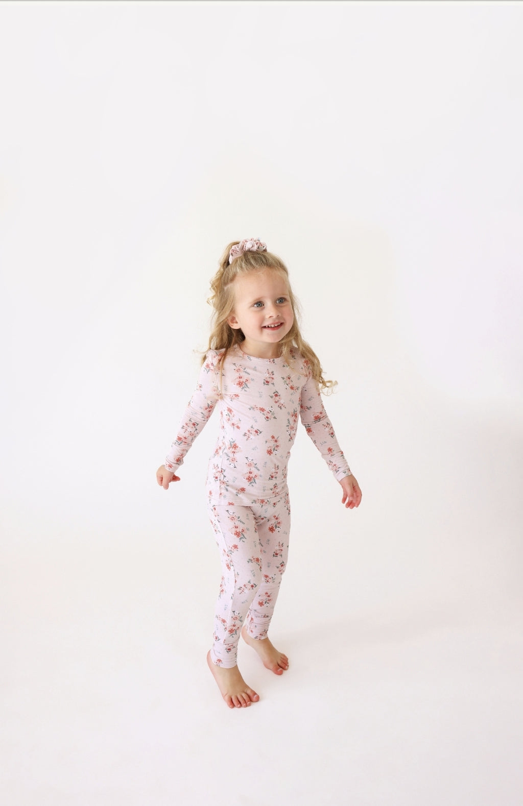 Posh Peanut bamboo pajama set, London autumn microfloral, worn by toddler