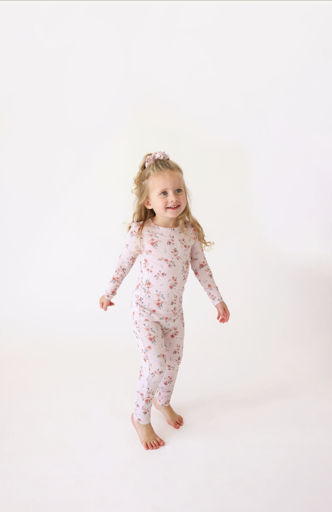 Posh Peanut bamboo pajama set, London autumn microfloral, worn by toddler