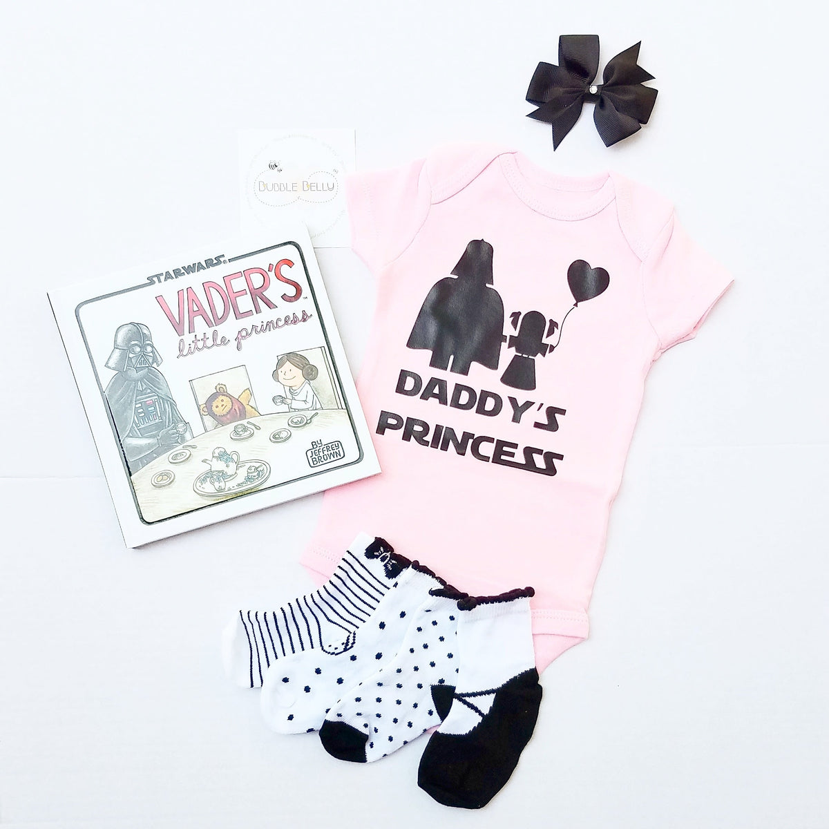 Daddy's Little Princess pink baby bodysuit, gift set flat lay