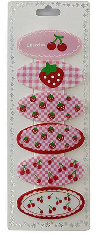 Strawberry and cherry snap hair clip set, close-up