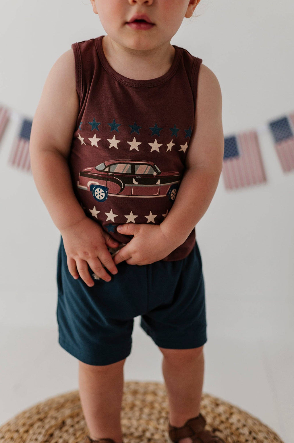 Boys bamboo Americana tank top, hot rod brick, worn by boy standing
