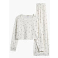 White pointelle lounge set with teddy bear and bow print: long-sleeve top and wide-leg pants