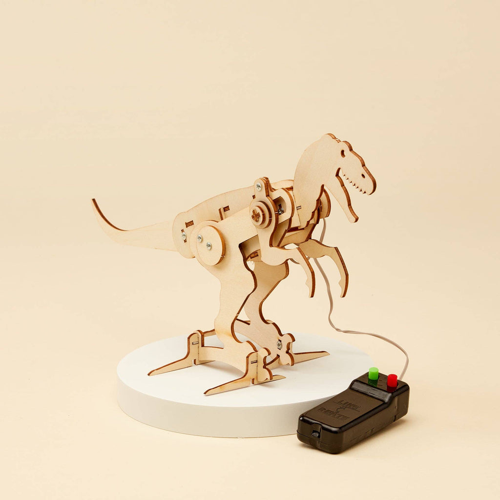 Wooden DIY STEM kit, battery t-rex robot, front view