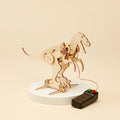 Wooden DIY STEM kit, battery t-rex robot, front view