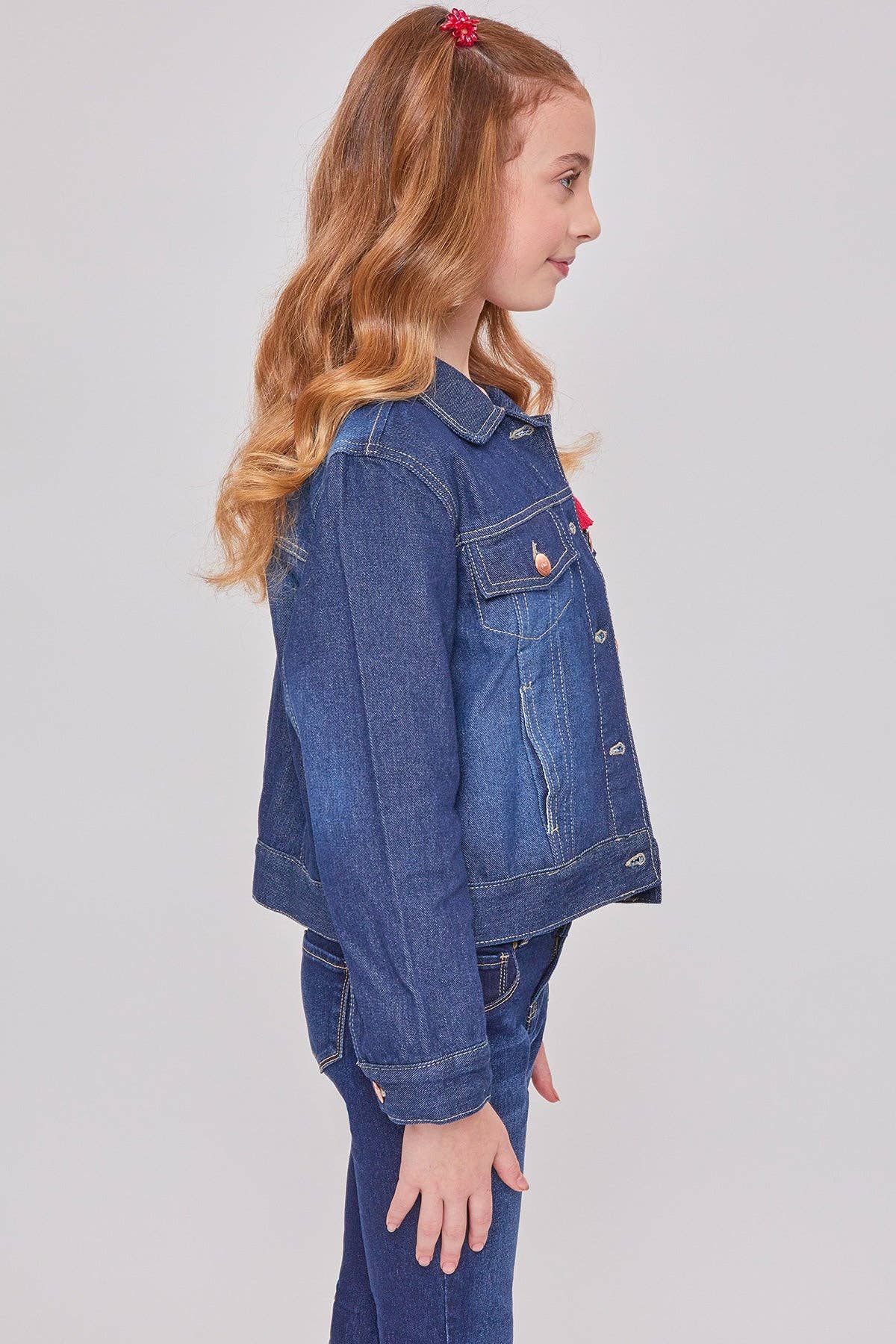 Girls medium wash classic denim jacket, side view